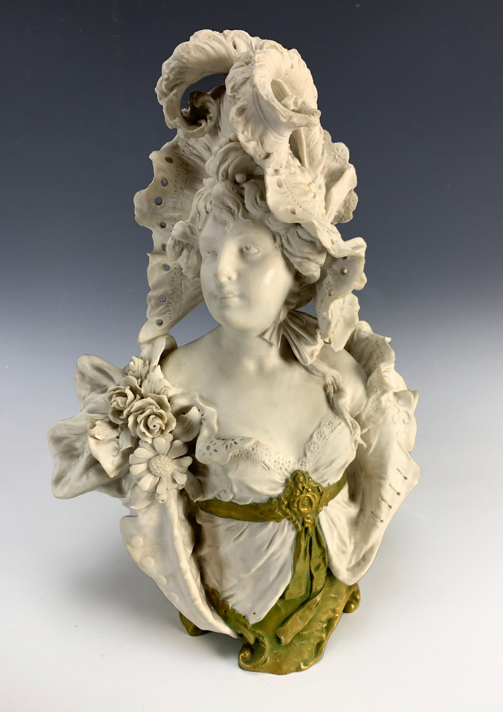 Ernst Wahliss (1837-1900) Bust of a Maiden: Circa 1890. Beautiful art nouveau bisque porcelain lady with a fancy hat made by well-known maker Ernst Wahliss. Signed with the crown mark, very good condition, 15" tall x 10" wide.