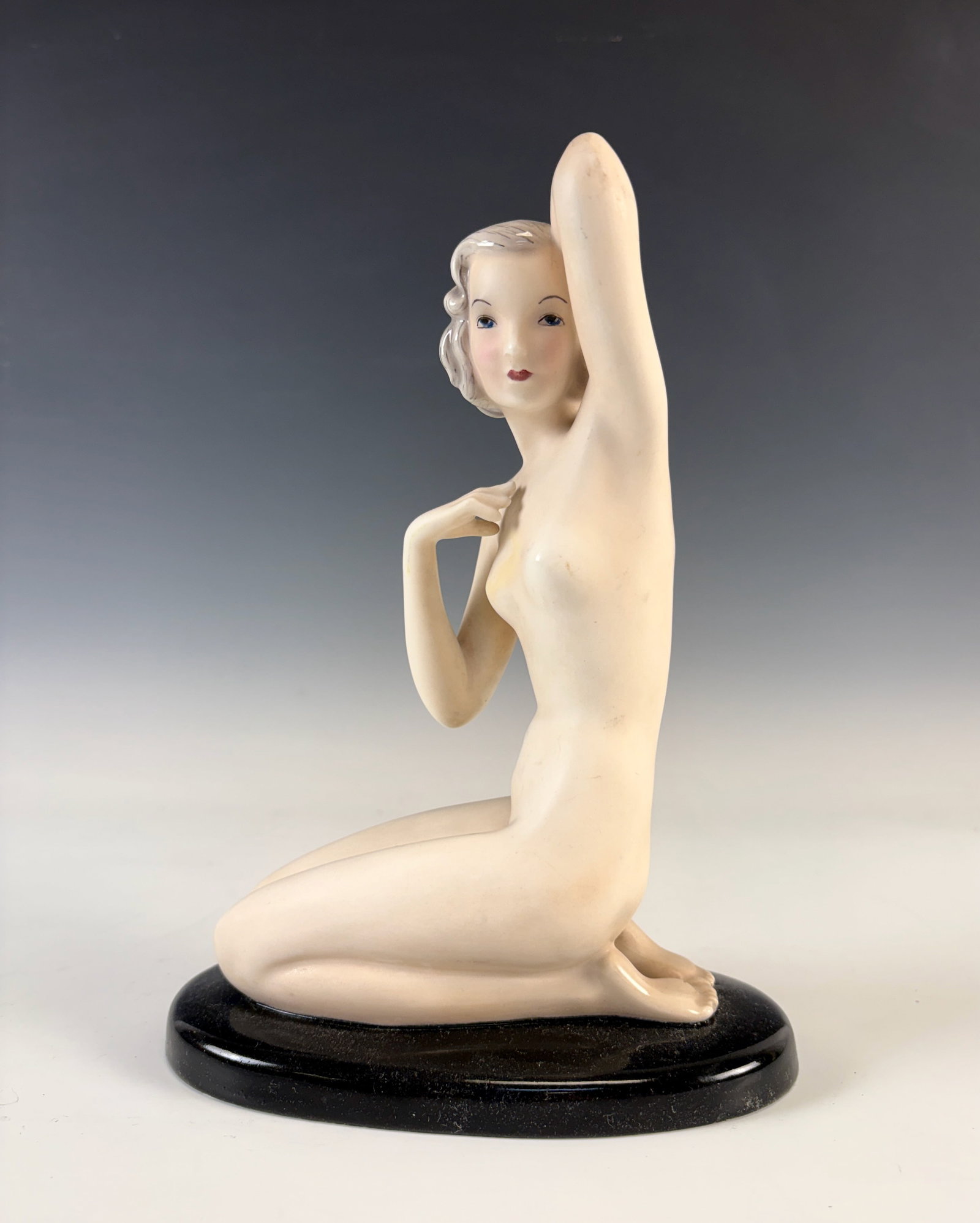Goldscheider Art Deco Nude Figurine sgd Prischl: Circa 1930, high glazed art deco earthenware figure of a kneeling nude, artist signed "Prischl" and marked "Goldscheider Wein Made in Austria" and numbered "8253, 49, 10", good condition, height 9.5"