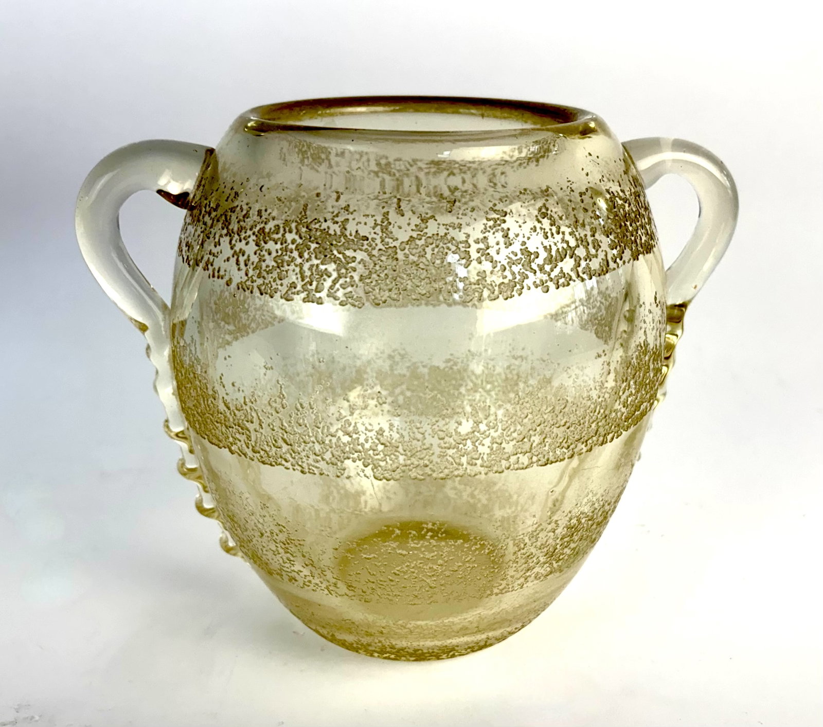 Daum Nancy Art Deco Handled Vase Sgd: Circa 1920, a signed art glass vase having a transparent yellow body with acid cut rows of design and two applied handles, signed "Daum Nancy" with Cross of Lorraine, 7.25" x 8.5", very good condition