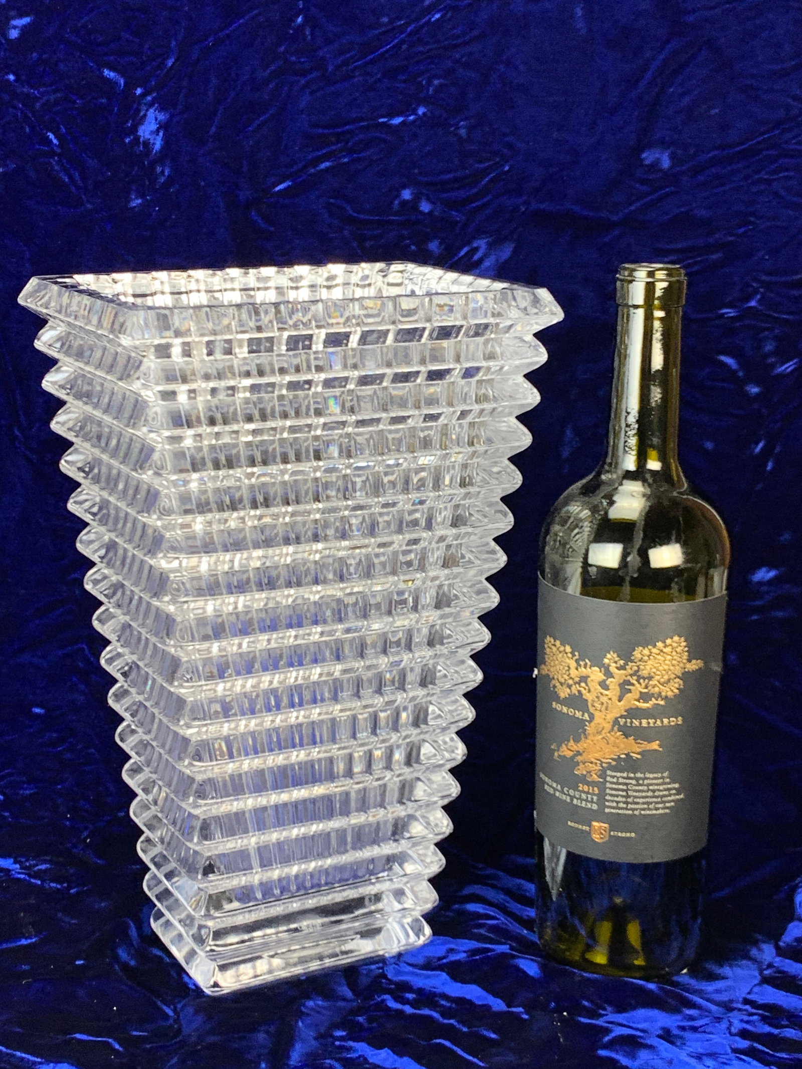 Large Baccarat Crystal Eye Vase: Baccarat crystal vase with horizontal beveled stepped panel design, signed on the bottom with Baccarat logo, current price is $2,100.00, excellent condition, 11 3/4" x 7 1/4" wide at the top and 5 1/4