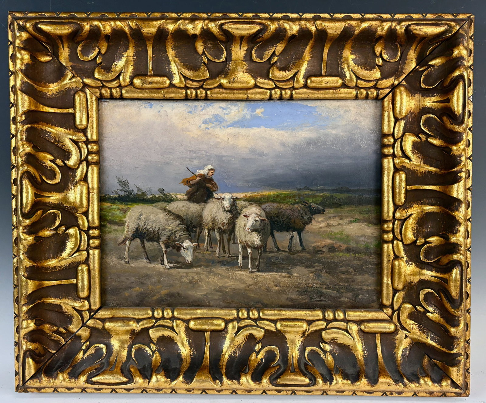 Jef louis Van Leemputten Landscape with Sheep: Jef Louis Van Leemputten (Belgium 1867–1948) pastoral scenic oil on canvas of a shepherd with his flock while a thunderstorm approaches, signed, mounted in ornate gold frame, very good condition, si