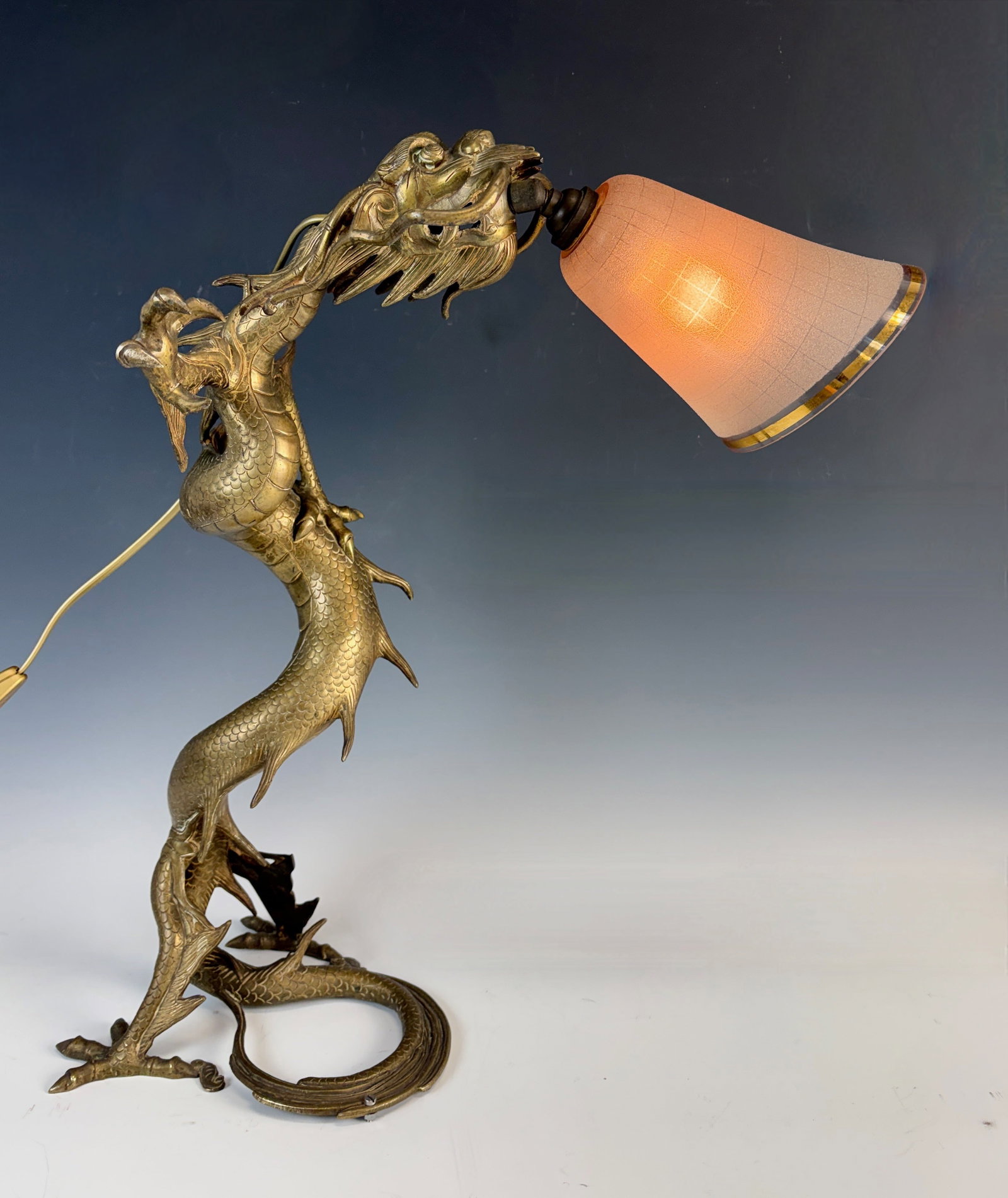 Bronze Dragon Lamp with Glass Shade: Circa 1900, rare figural lamp in the Asian taste modeled as a dragon with original glass shade, very good condition, 19.5" x 13" at widest