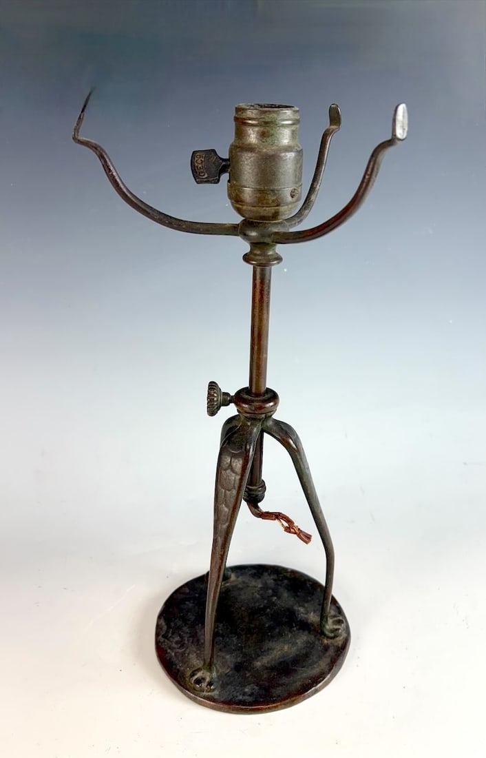 Rare Tiffany Studios 3 Legged Bronze Lamp Base: Rarely seen is this signed Tiffany Studios 3 legged lamp base, has a adjustable standard with 3 arms to support a 7" shade. Signed on the bottom "Tiffany Studios New York" "5202", socket marked