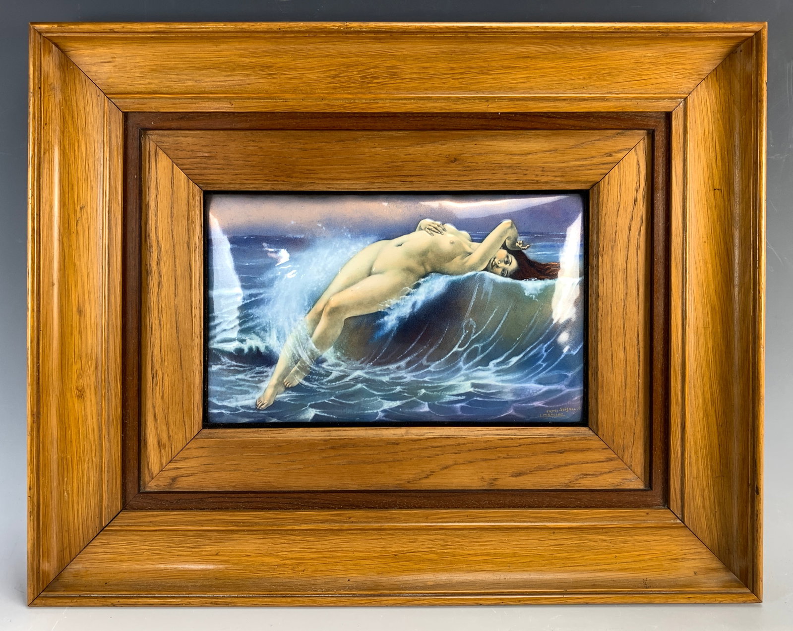 Limoges Enamel "Nude in Waves" after Seignac: Beautiful Limoges enamel plaque after Guillaume Seignac's painting "La Vague", depicting a nude laying on her back in waves. Signed lower right "Apres Seignac, G.L. Mercier" (enamel artist). Mounted