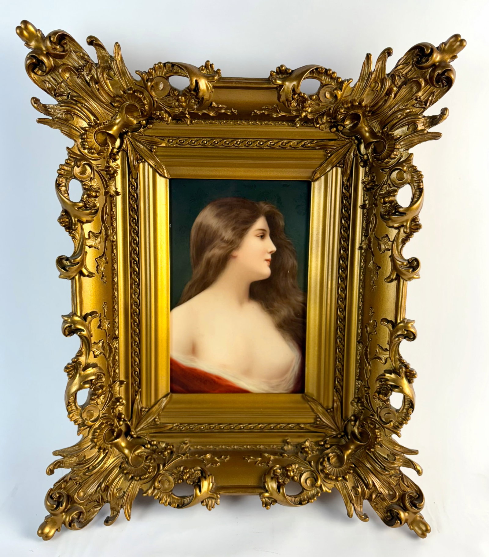 KPM Handpainted Portrait Plaque sgd Wagner: Late 19th C, a KPM porcelain plaque of a beauty, signed "Wagner" and with impressed "KPM" with scepter mark on verso, mounted into a beautiful original ornate antique frame, sight 9.5" x 6.25", with f