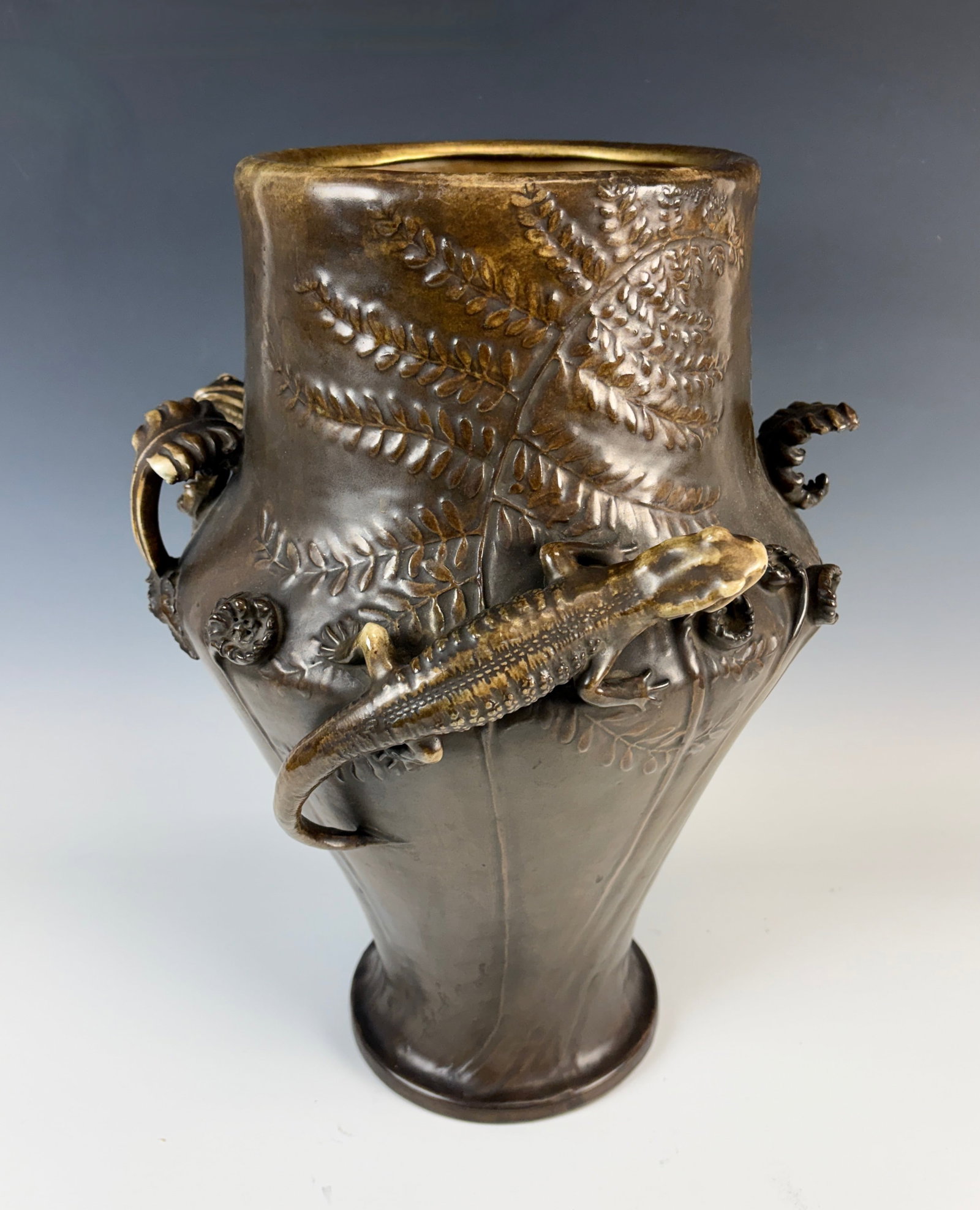 Stellmacher Salamander Vase Sgd: Eduard Stellmacher (1868-1929), circa 1900, an exceptional design having two salamanders with fern handles and ferns with bronze look in relief on sides, against brown matt finish ground, with raised 