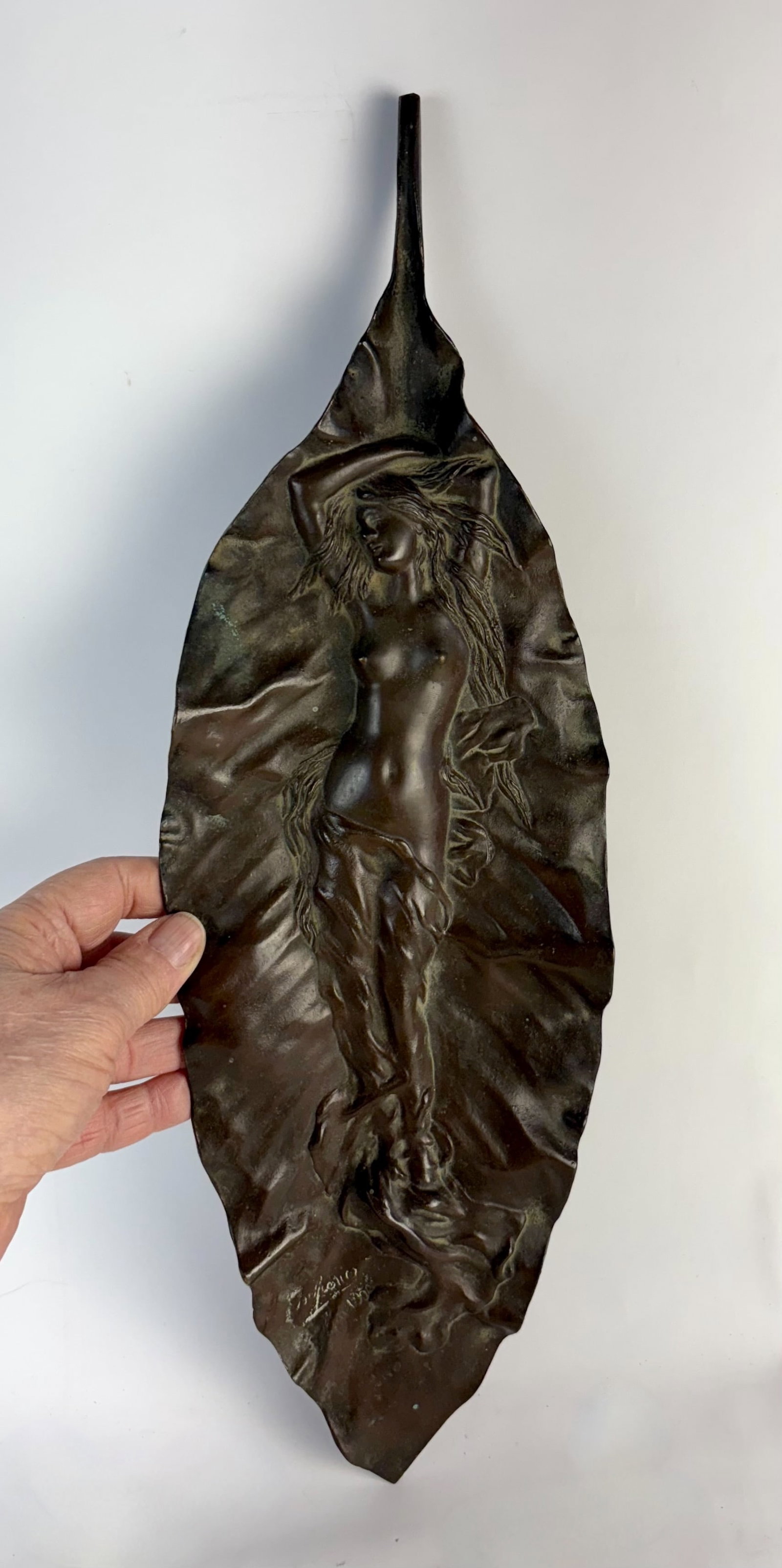 Georges Delperier Art Nouveau Bronze Nude Figure: Dated 1902, Georges Delperier (French 1865-1936) A wonderful art nouveau bronze figure of a nude reclining upon a giant leaf with brown patina, Artist signed and dated "Salon 1902", 18.5" long x 6", v