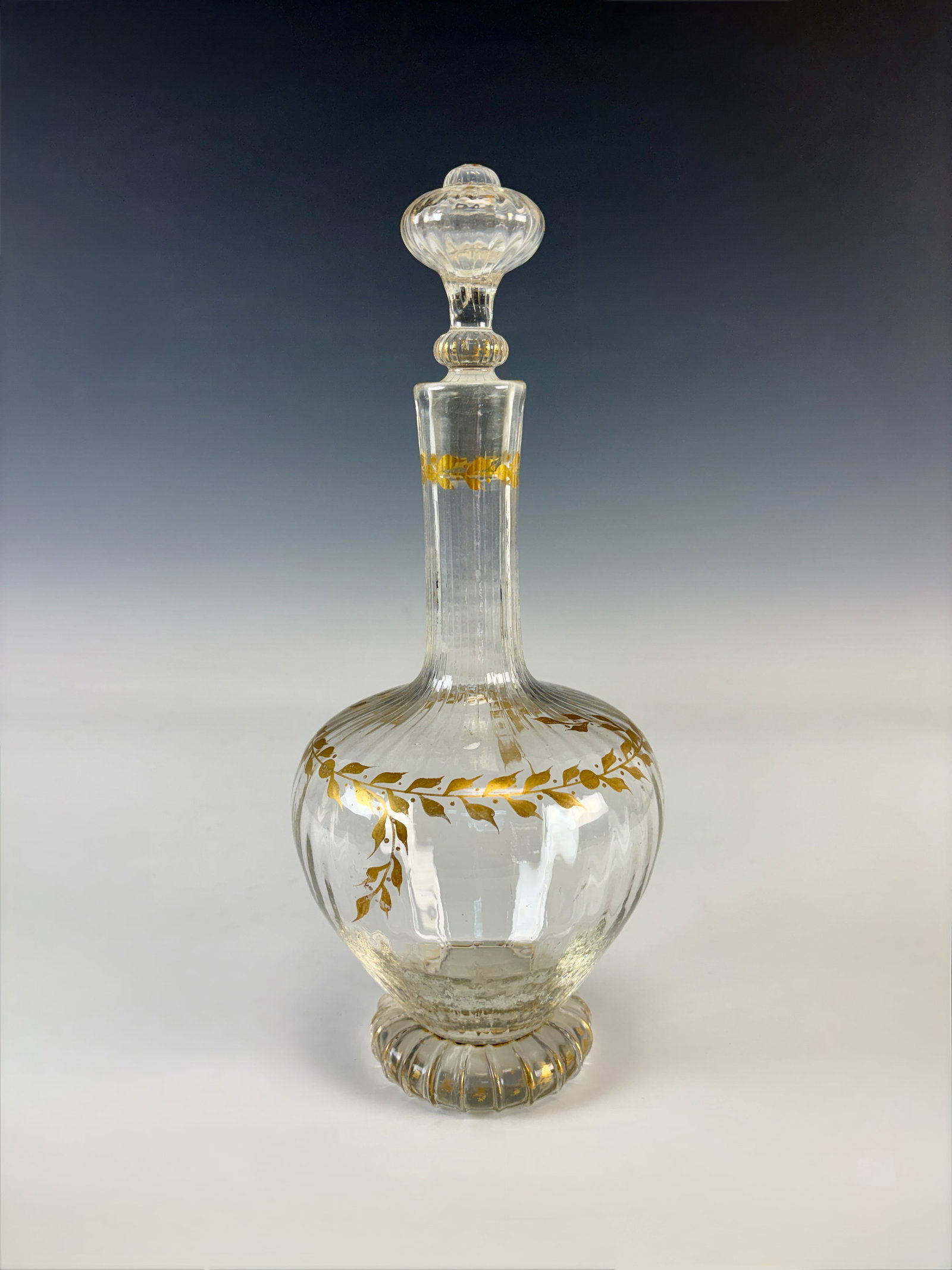 Emile Galle Carafe with Stopper: Circa 1900, Emile Galle (France 1846-1904) a fine signed Galle clear glass carafe decorated with gold gilt foliage, signed with etched Galle signature, both carafe and stopper in fine condtion, 11.5" 