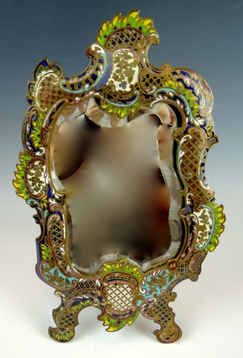 Champleve Enamel & Bronze Art Nouveau Mirror: Beveled glass, circa 1895. Measuring 12 1/4" x 7". Estimate $800 - $1,200 Starting Bid $200