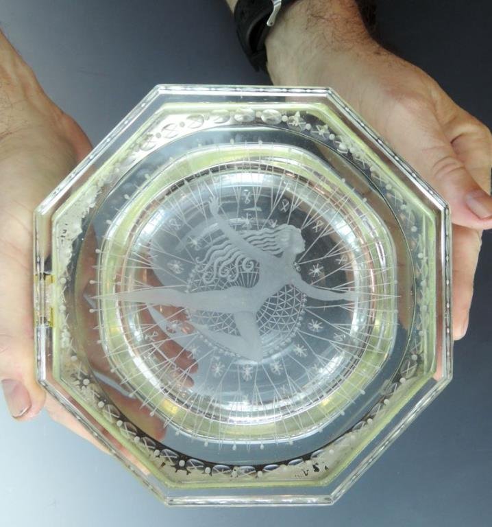 Rare Erte Lidded Murano Glass Box: Rare Erte Lidded Murano Glass Box Dated 1989, an octagonal heavy glass lidded box etched with a stylized nude female dancer amongst fancy designs, having silver metal rims and a sterling silver Erte t