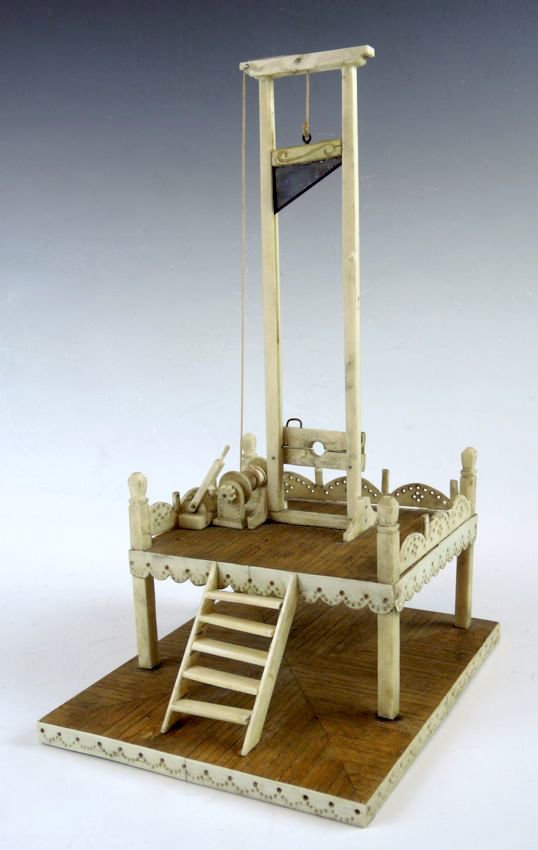 Whale Bone Prisoner of War Model Guillotine: Whale Bone Prisoner of War Model Guillotine A detailed Prisoner of War model of a guillotine, carved from whale bone, 11" x 6.5" x 5.5".Start Bid $400