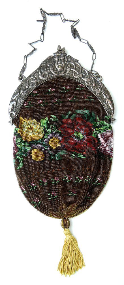 Antique Beaded Purse w Silver Frame w Relief Desig: Circa 1880, a pretty beaded purse with flowers and mounted on a fabulous 800 silver frame decorated with Medusa, snakes and griffins, with chain handle, very good condition including fabric interior,