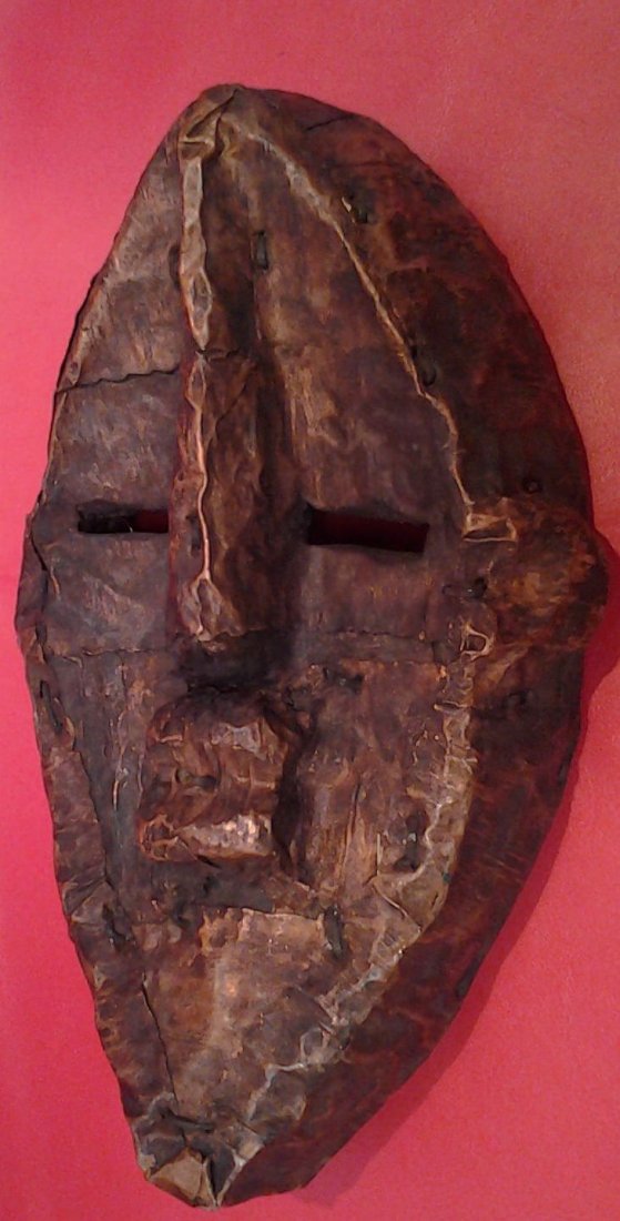 African Lwalwa Tribe Copper Mask 12x7" (Part of a: The Lwalwa mask is an ?mvondo? mask which is wore by men. The Lwalwa masks display a balanced composition, an enlarged angular nose, a protruding mouth and narrow slotted eyes. These sharply delineate
