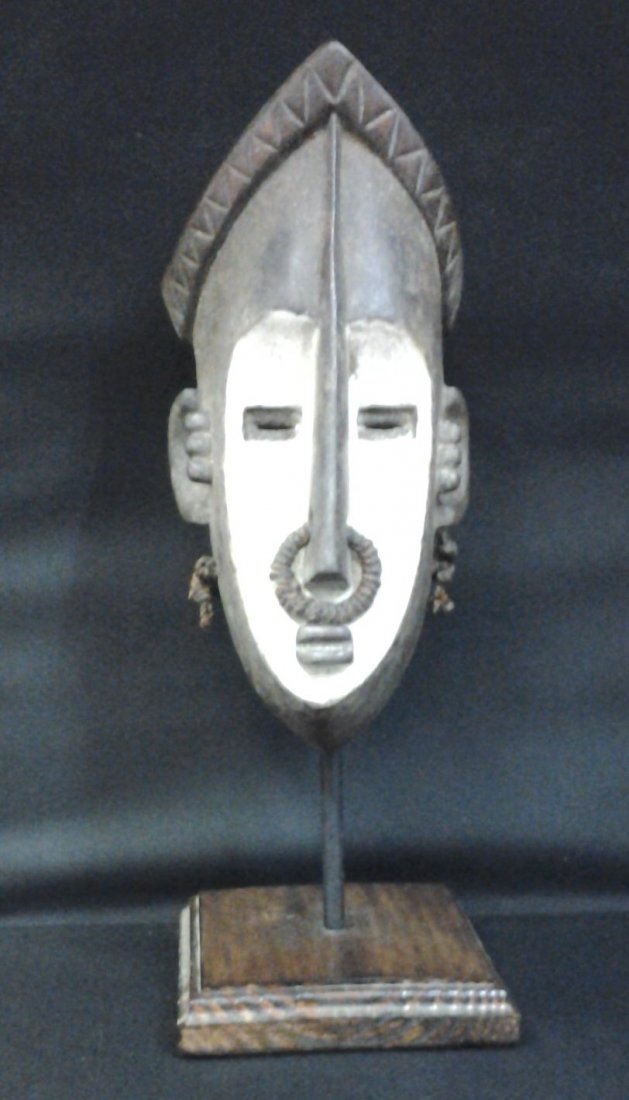African Lwawal Tribe Ritual Mask Congo-Angola 14x7",: The Lwalwa mask is an ?mvondo? mask which is wore by men. The Lwalwa masks display a balanced composition, an enlarged angular nose, a protruding mouth and narrow slotted eyes. These sharply delineate