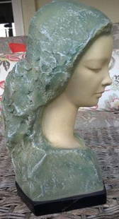 Female Bust Signed Glinsky of Cast Marblestone: Beautiful Cast Marblestone Female Bust wearing a green shawl with her eyes closed. Signed Glinsky About the artist: Vincent Glinsky was born in Russia in 1895 and immigrated to America as a young man.