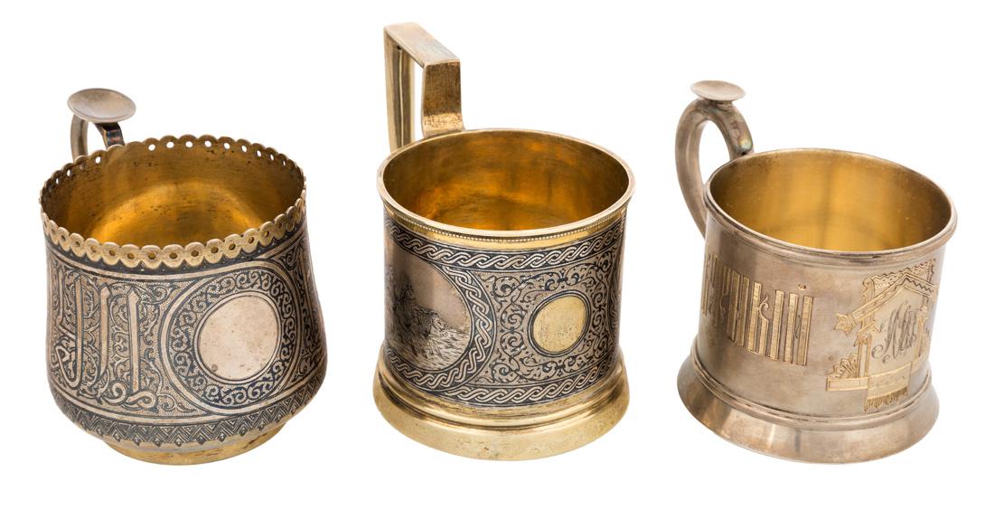 A GROUP OF THREE RUSSIAN SILVER TEA HOLDERS, VARIOUS: A GROUP OF THREE RUSSIAN SILVER TEA HOLDERS, VARIOUS MAKERS INCLUDING GRACHEV, ST. PETERSBURG AND MOSCOW, LAST QUARTER OF THE 19TH CENTURY overall weight: 496.3 grams. Comprising: a) of traditional fo