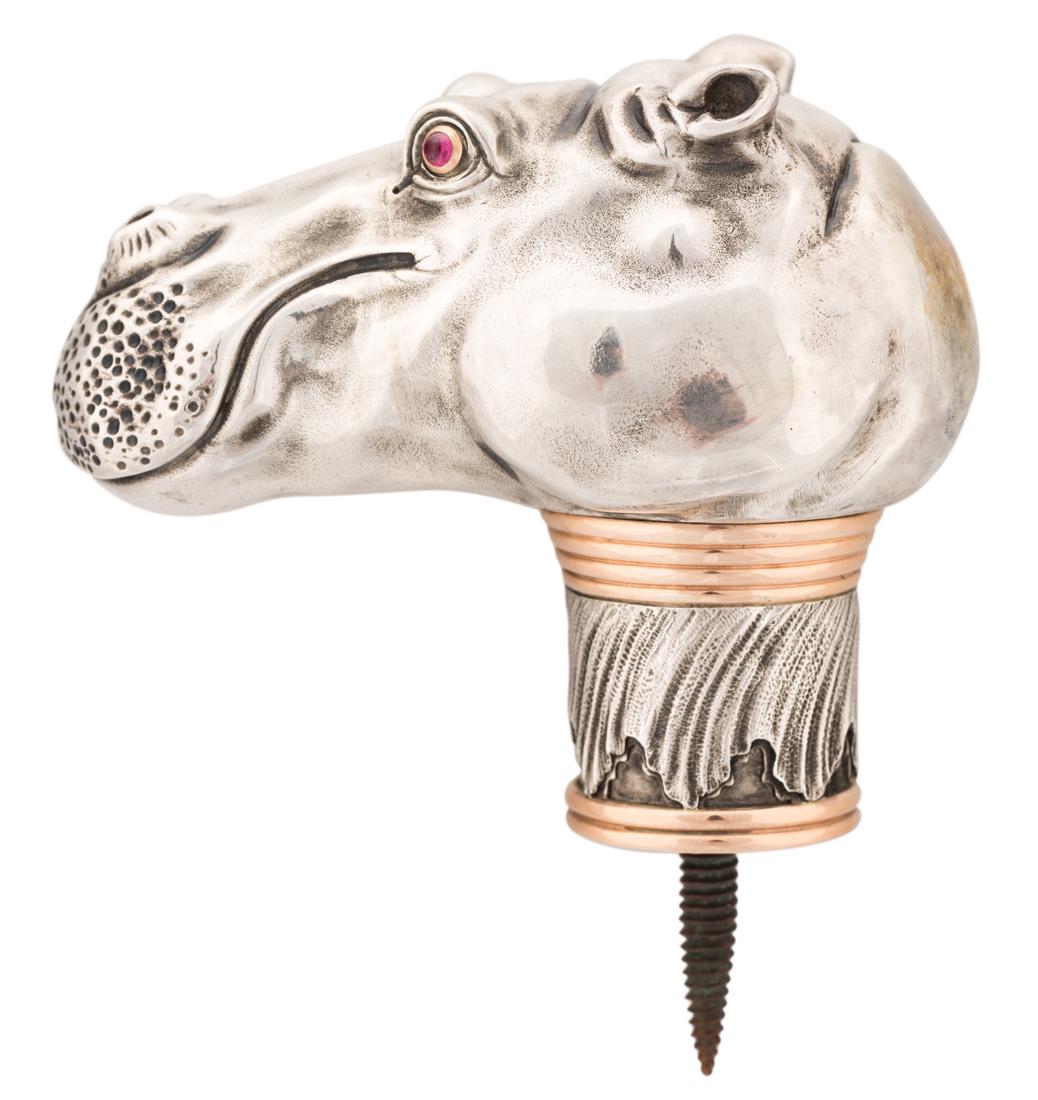 A RUSSIAN SILVER AND GOLD CANE HANDLE IN A FORM OF (1 of 4)