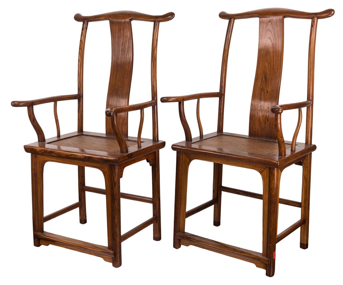 A PAIR OF CHINESE ELMWOOD SOUTHERN OFFICIAL HAT CHAIRS,: A PAIR OF CHINESE ELMWOOD SOUTHERN OFFICIAL HAT CHAIRS, LATE QING DYNASTY a yoke back form with slightly curved back splat, weeping round bars forming the armrest, solid square seat rests with bamboo