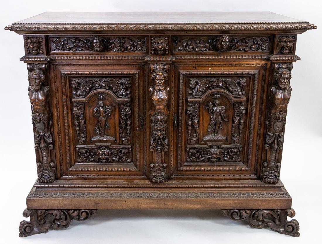 A RENAISSANCE REVIVAL WOODEN COMMODE, EARLY 20TH: A RENAISSANCE REVIVAL WOODEN COMMODE, EARLY 20TH CENTURY rectangular, on four feet, of which two are spreading, carved throughout with acanthus leaves, the front with three atlas figures separated by 