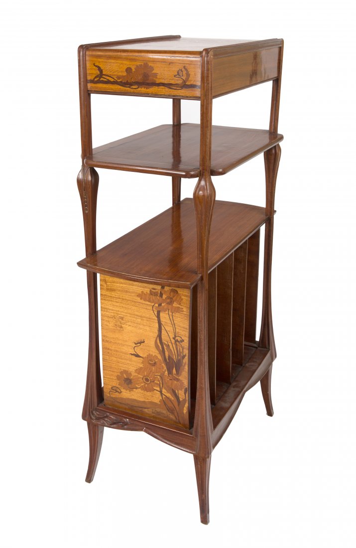 A LOUIS MAJORELLE MAHOGANY AND MARQUETRY MUSIC CABINET,: A LOUIS MAJORELLE MAHOGANY AND MARQUETRY MUSIC CABINET, CIRCA 1900 inlaid in fruitwood, with top drawer, the bottom tier with four sections, featuring perennial field flowers, signed in marquetry lowe