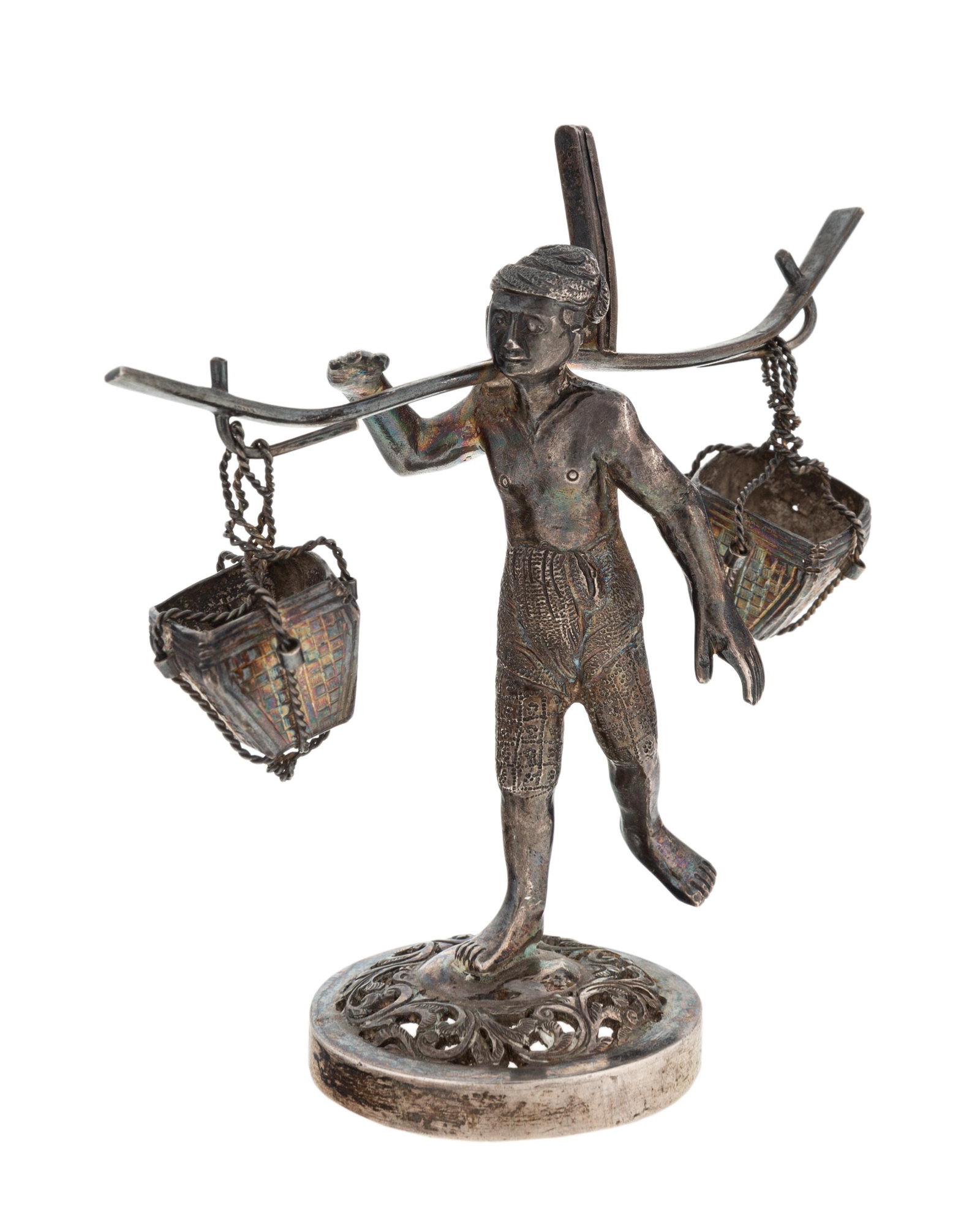 SMALL SILVER STATUE OF MAN CARRYING BUCKETS silver: SMALL SILVER STATUE OF MAN CARRYING BUCKETS silver statue of man carrying a post with a bucket on each end, standing on a circular base with acanthus leaf design, silver; height: 8.89 cm ( 3 1/2 in.)