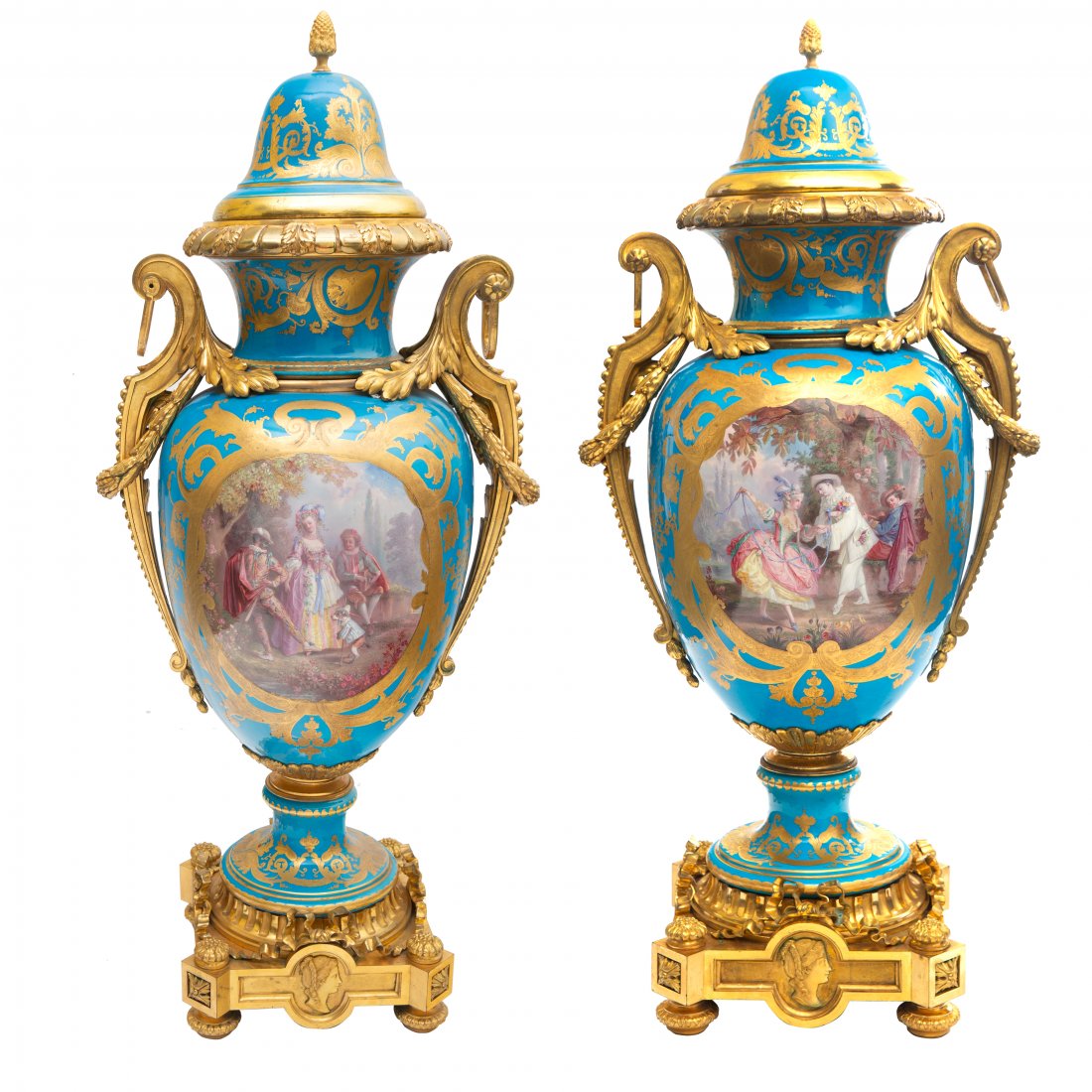 A PAIR OF MONUMENTAL FRENCH SEVRES STYLE ORMOLU-MOUNTED: A PAIR OF MONUMENTAL FRENCH SEVRES STYLE ORMOLU-MOUNTED PORCELAIN VASES, LATE 19TH CENTURY each of baluster form, two-handled, the handles formed as scrolling acanthus leaves and laurels with suspensi