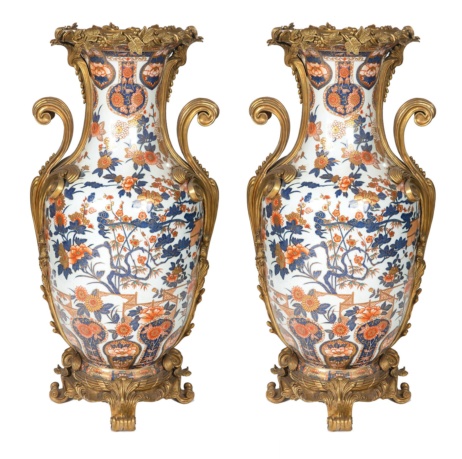 A PAIR OF CHINESE ORMOLU-MOUNTED PORCELAIN VASES, 20TH: A PAIR OF CHINESE ORMOLU-MOUNTED PORCELAIN VASES, 20TH CENTURY each of bulbous ovoid form, with flaring neck, the body with continous Imperial Ming-style underglaze-blue and copper-red flower decorati