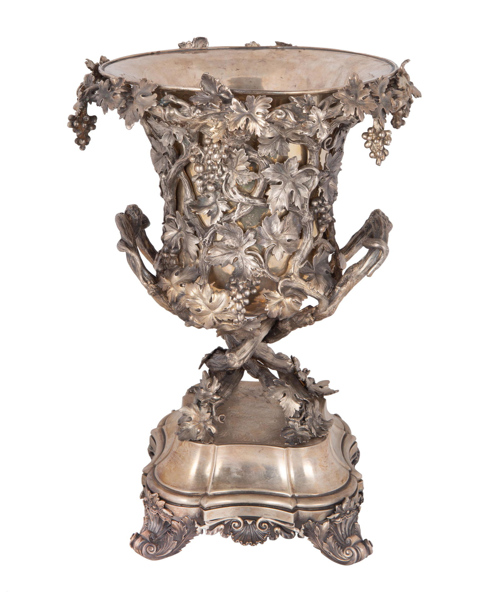 A SILVER VICTORIAN WINE COOLER, JOHN SAMUEL HUNT FOR: A SILVER VICTORIAN WINE COOLER, JOHN SAMUEL HUNT FOR HUNT & ROSKELL, LATE STORR & MORTIMER, LONDON, 1860 of classical urn form, designed with highly stylized and ornate grapevine motifs, with twin ent