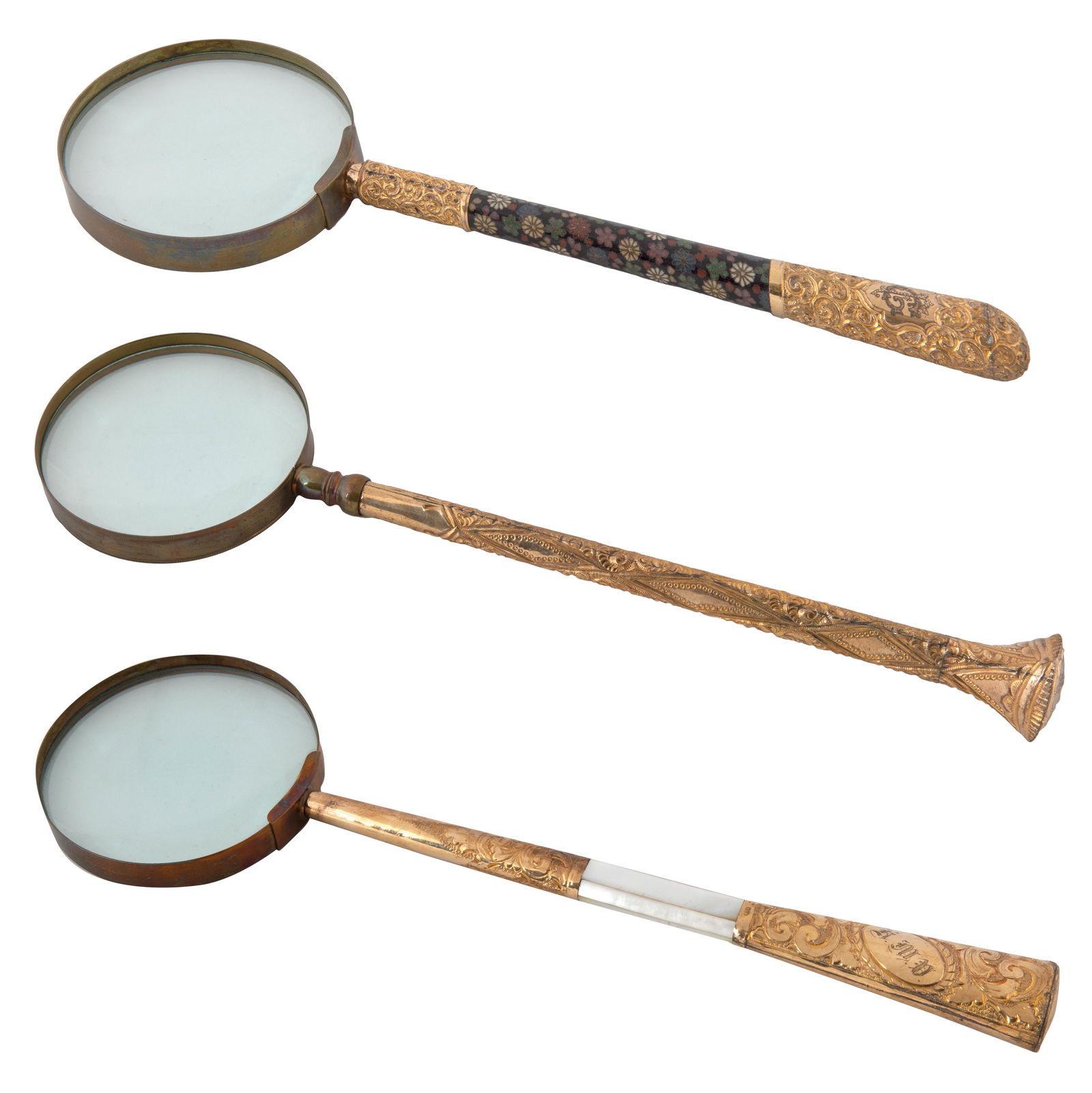 A SET OF THREE VICTORIAN BRASS MAGNIFYING GLASSES, LATE (1 of 2)