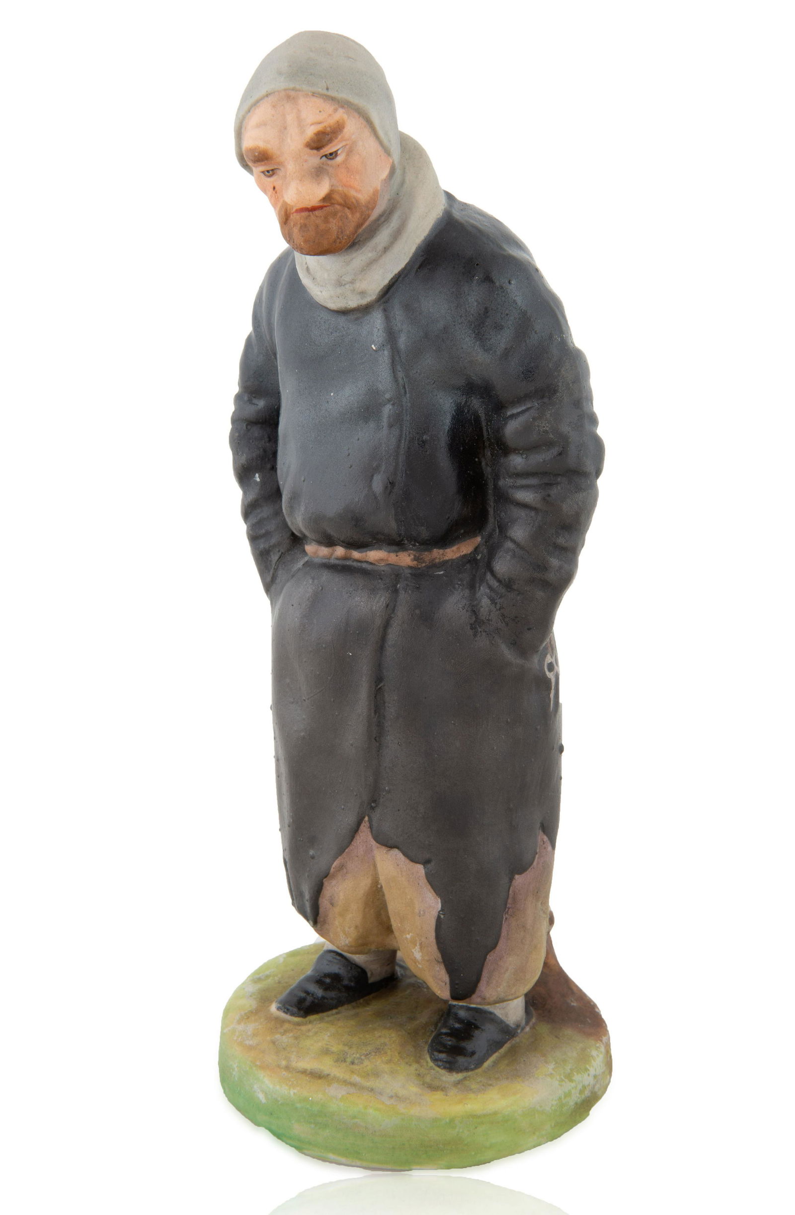 A RUSSIAN PORCELAIN FIGURINE OF PLIUSHKIN FROM GOGALS (1 of 2)