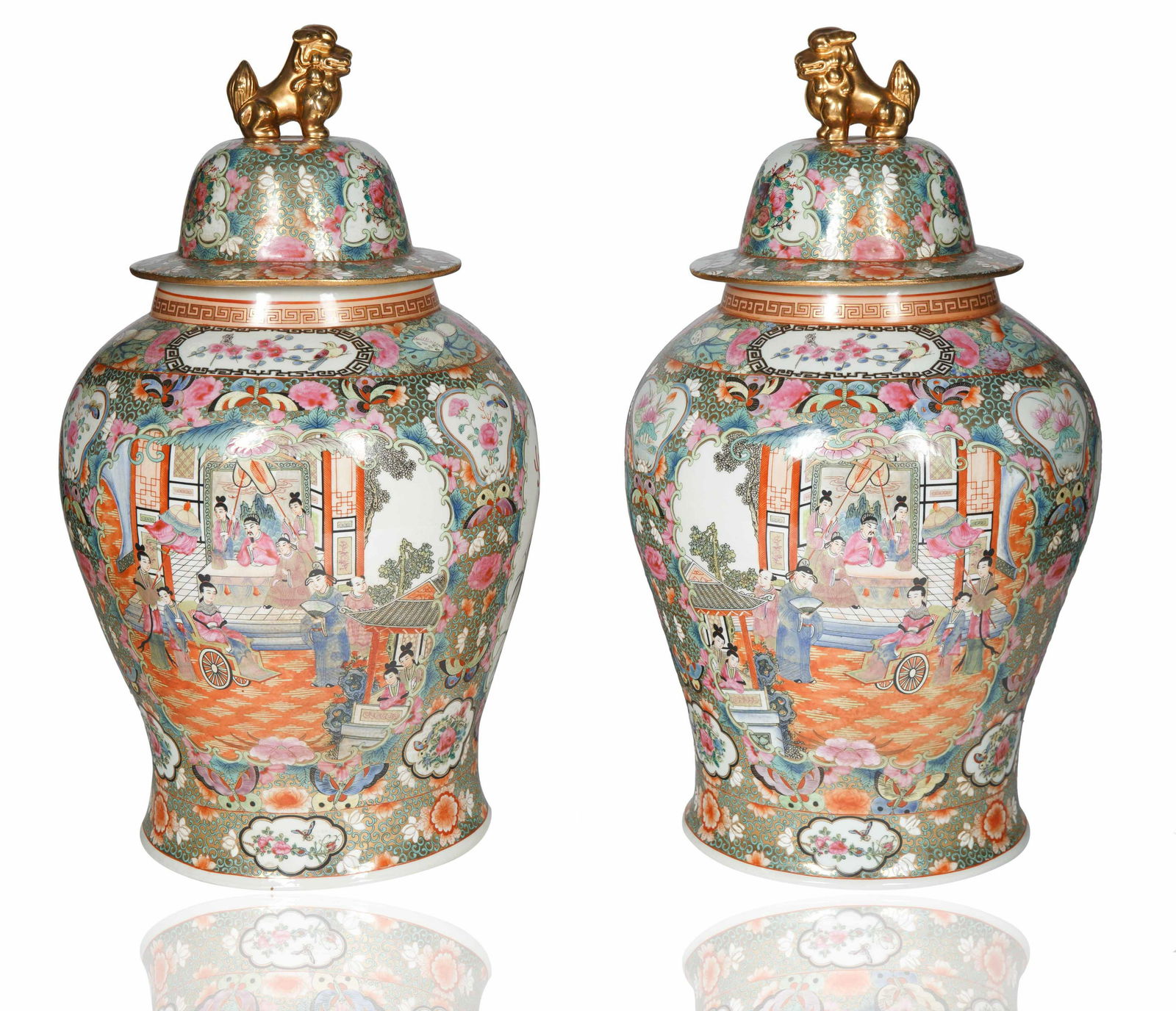 LARGE GINGER JAR FORM COVERED VESSELS: ginger jar form the body with famille rose ground, with three floral cartouches featuring different still lives, the cover with a gilt foo dog, each with dynasty possibly Qianlong mark in iron red und