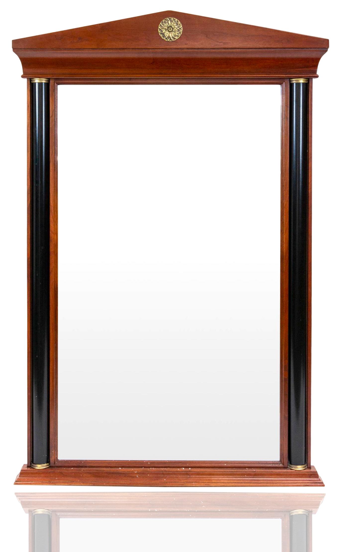 ETHAN ALLEN 'MEDALLION' WALL MIRROR: rectangular, the wooden frame formed as a facade with engaged columns, the pediment centered with flower, maker's stamp on verso backing board; overall dimensions: 127 x 82.5 cm (50 x 32 1/2 in.) COND