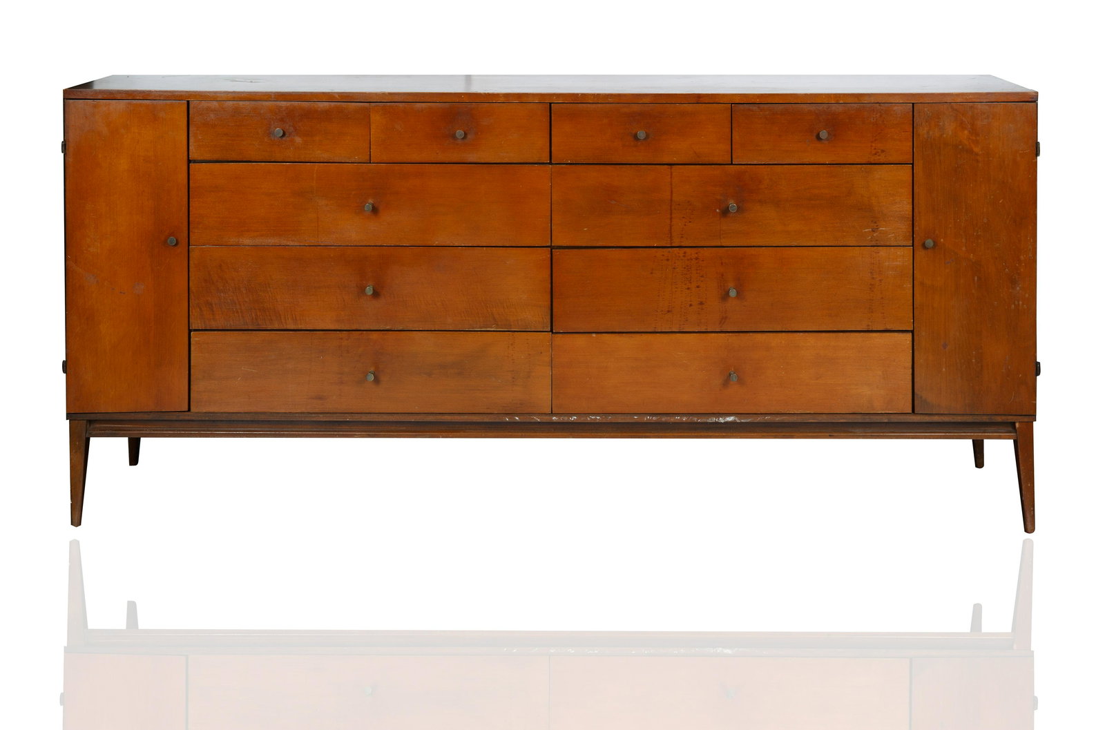 A MIN-CENTURY TWENTY-DRAWER DRESSER DESIGNED BY PAUL MCCOBB (AMERICAN 1917-1969) FOR WINCHENDON (1 of 2)