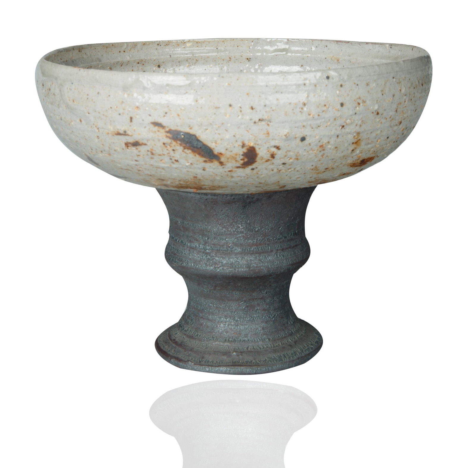 A SMALL MID-CENTURY GLAZED STONEWARE CENTERPIECE, DESIGNED FOR ARABIA FINLAND, 1963: A SMALL MID-CENTURY GLAZED STONEWARE CENTERPIECE, DESIGNED FOR ARABIA FINLAND, 1963 circular atop a balbous stand, stamped with factory mark in black, incised with factory mark, incised with signature