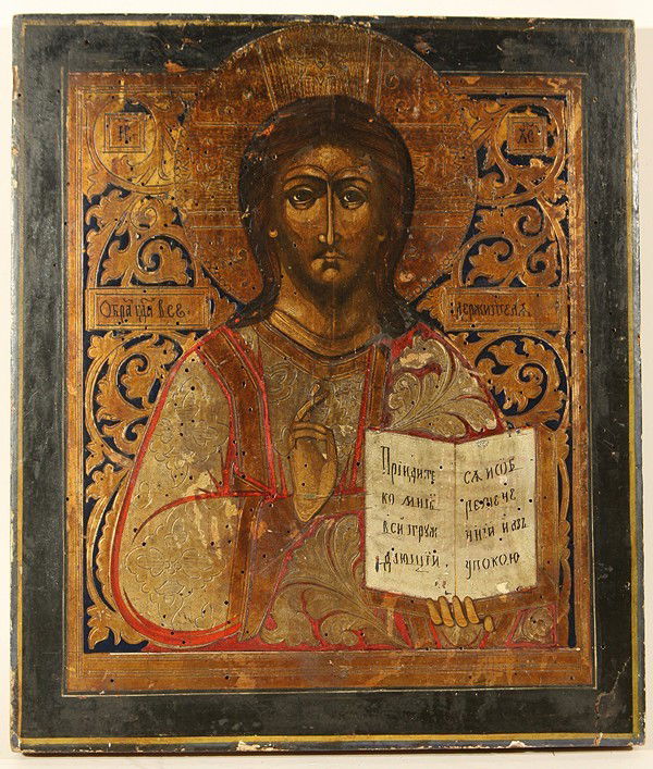 ANTIQUE RUSSIAN ICON CHRIST PANTOCRATOR: A RUSSIAN ICON OF CHRIST PANTOCRATOR, 19TH CENTURY. THIS LOT IS BEING SOLD WITHOUT RESERVE. Egg tempera, gold leaf, and gesso on wood panel. Extensive worm hole damage. 35.5 x 30.5 cm (14 x 12 in.)