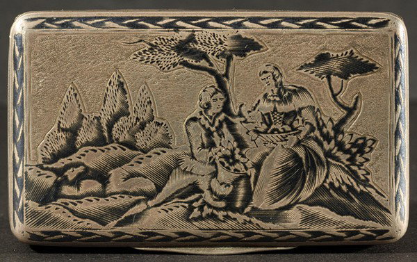 RUSSIAN SILVER AND NIELLO SNUFF BOX: A RUSSIAN SILVER AND NIELLO SNUFF BOX, 1858, silver snuff box decorated with niello scenes depicting a courting couple in a landscape and a village, monogrammed 'M. C' inside, length: 7.6 cm. (3 in.),