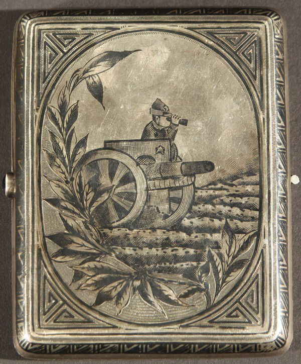 SOVIET SILVER ANTIQUE CIGARETTE CASE RUSSIAN: A SOVIET SILVER AND NIELLO CIGARETTE CASE, MOSCOW, 1920-30S, with fine niello decoration on each side depicting a Red Army soldier with cannon on one side, and Red Fleet ship with setting sun on the o