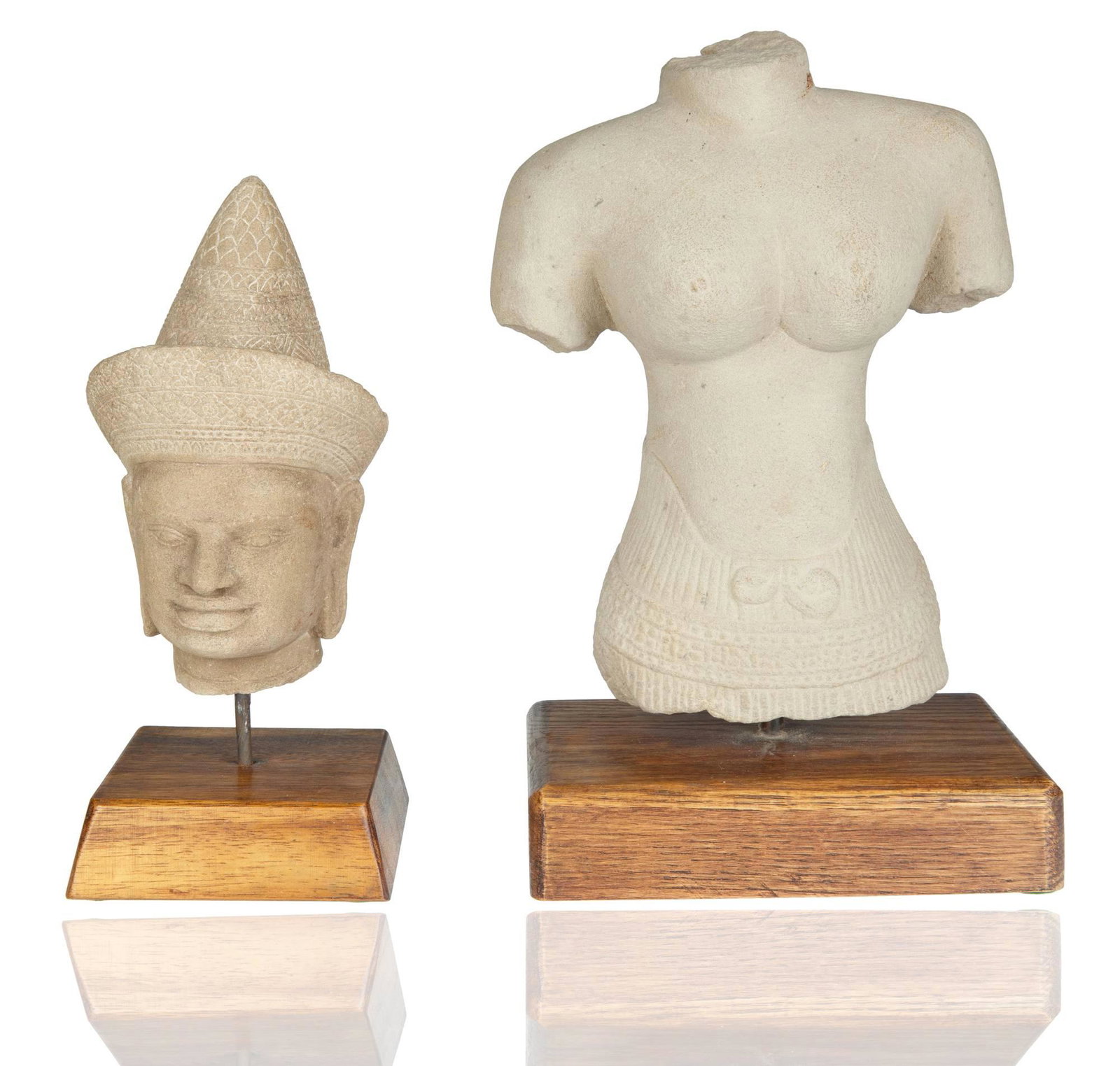 A SOUTHEAST ASIAN SANDSTONE PHNOM DA STYLE OF BUDDHA AND FEMALE TORSO, KHMER ANGKOR, MOST LIKELY: A SOUTHEAST ASIAN SANDSTONE PHNOM DA STYLE OF BUDDHA AND FEMALE TORSO, KHMER ANGKOR, MOST LIKELY 15TH-CENTURY comprising: a) A Carved Sandstone Female Torso, Khmer Angkor, curved waist, with carved d