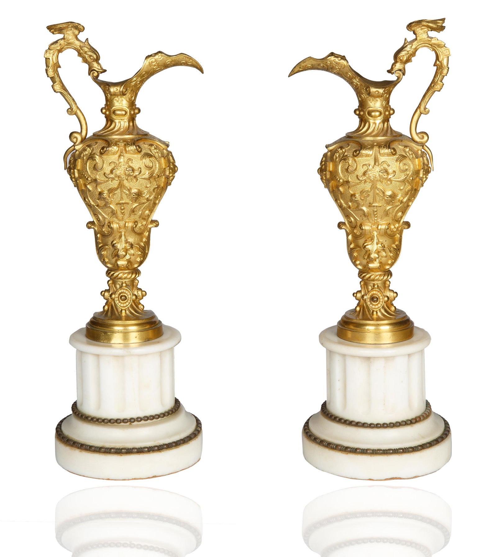 A PAIR OF GILT BRASS EWER FORM CANDLE HOLDERS ON MARBLE BASES (1 of 2)