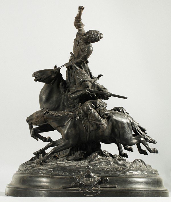 LANCERAY ANTIQUE RUSSIAN CAST IRON COSSACKS: EVGENY ALEXANDROVICH LANCERAY (RUSSIAN 1848-1886), “Le triomphe des cosaques”, cast iron with a black patina, 50.5 x 44 cm. (20 x 17 1/4 in.), signed in Cyrillic 'Lancere' on base, Kasli foundry m