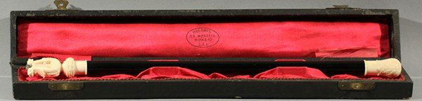 ANTIQUE RUSSIAN IMPERIAL EBONY IVORY CONDUCTOR'S B: IMPERIAL EBONY AND IVORY CONDUCTOR'S BATON, Shubert, St. Petersburg, ebony conductor's baton capped by an ivory base decorated with acanthus leaves and a tip carved in the shape of a lyre capped by a