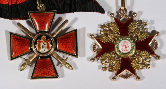 PAIR OF ANTIQUE RUSSIAN ORDERS VLADIMIR AND STANIS: A PAIR OF RUSSIAN MILITARY ORDERS, a) A Badge of the Order of St. Vladimir, Third Class, bulbous red enamel and gold, crossed swords at angles, with original ribbon bow, 45 x 40 mm. (1 ½ x 1 3/4