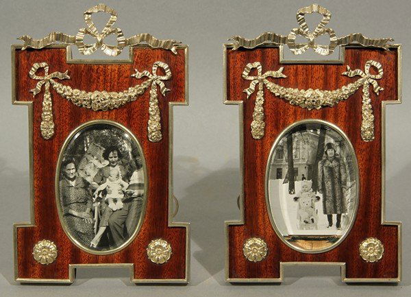 PAIR OF ANTIQUE RUSSIAN GILT SILVER AND WOOD PHOTO: PAIR OF GILT SILVER AND WOOD PHOTO FRAMES, 1908-1926, H-shaped frame crowned by a bow, interior decorated with a hanging garland of roses, the stand of a scrolling design, length: 14.7 cm. (5 ¾ in.),