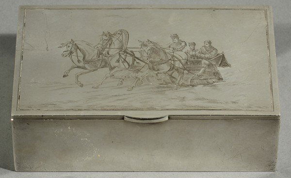 GRACHEV ANTIQUE RUSSIAN SILVER PLAYING CARD BOX 18: GRACHEV SILVER PLAYING CARD BOX, c. 1860s, gilt interior, exterior panel engraved with a couple in a horse-driven coach, initialed in Cyrillic 'AFZh' lower right, gilt interior, length: 14 cm. (5 ½ i