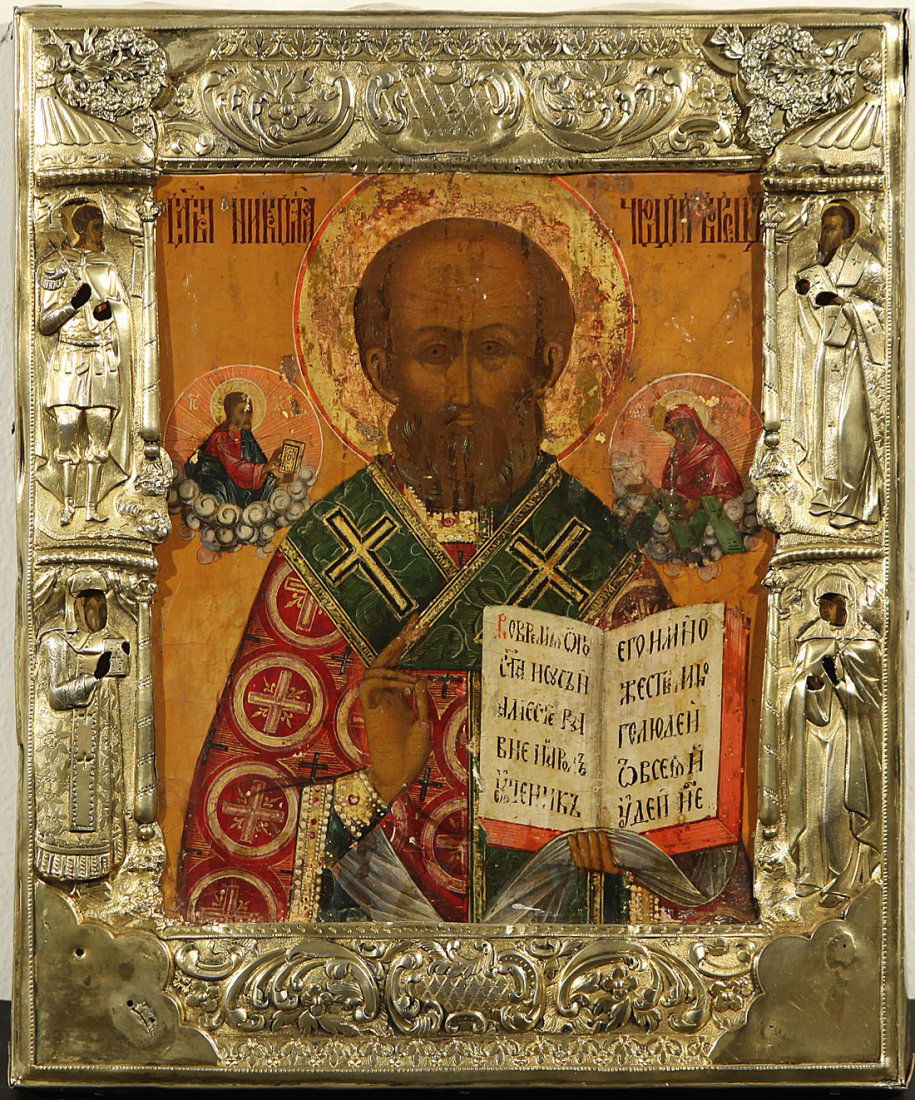 A RUSSIAN ICON OF SAINT NICHOLAS THE WONDERWORKER: A RUSSIAN ICON OF SAINT NICHOLAS THE WONDERWORKER WITH GILT SILVER OKLAD, ST. PETERSBURG, 1837. Egg tempera and gesso on wood panel. The painting probably 18th century. Overlaid with gilded silver rep