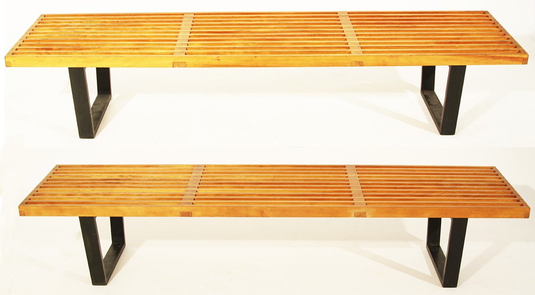A PAIR OF GEORGE NELSON PLATFORM BENCHES, c. 1960s: A PAIR OF GEORGE NELSON PLATFORM BENCHES, c. 1960s, the slotted platform bench finger-joined to the ebonised wood legs, 35.5 x 103.5 x 47 cm. (14 x 40 ¾ x 18 ½ in.) THIS LOT IS BEING SOLD WITHOUT RE