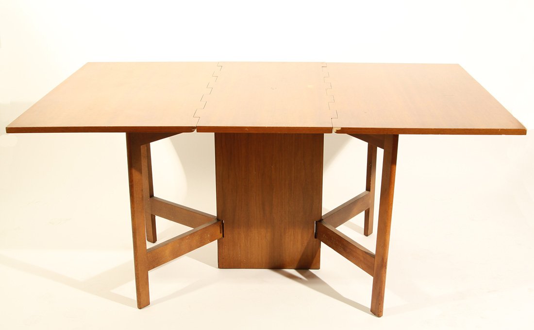 A LARGE GEORGE NELSON DROP LEAF SAW TOOTH TABLE, 1: A LARGE GEORGE NELSON DROP LEAF SAW TOOTH TABLE, 1960s, the three sections open and extend to a full length dining table, fully extended: 164.5 x 101.5 x 75.5 cm. (64 ¾ x 40 x 29 ¾ in.), closed: 101