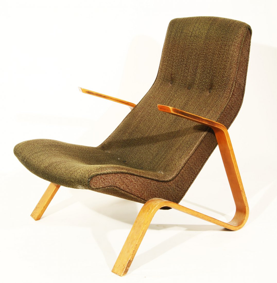 A GRASSHOPPER LOUNGE CHAIR BY EERO SAARINEN, green: A GRASSHOPPER LOUNGE CHAIR BY EERO SAARINEN, green tweed cushion, 87 x 66.5 x 89 cm. (34 ¼ x 26 ¼ x 35 in.) . THIS LOT IS BEING SOLD WITHOUT RESERVE.