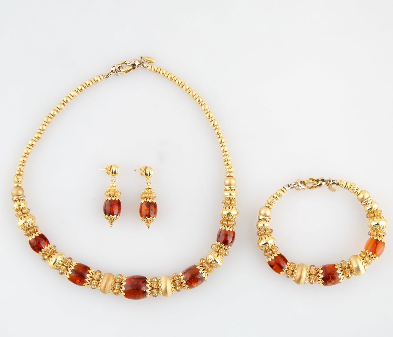 A SET OF ITALIAN SUN DAY 18K GOLD AND AMBER NECKLACE, EARRINGS, BRACELET (1 of 5)