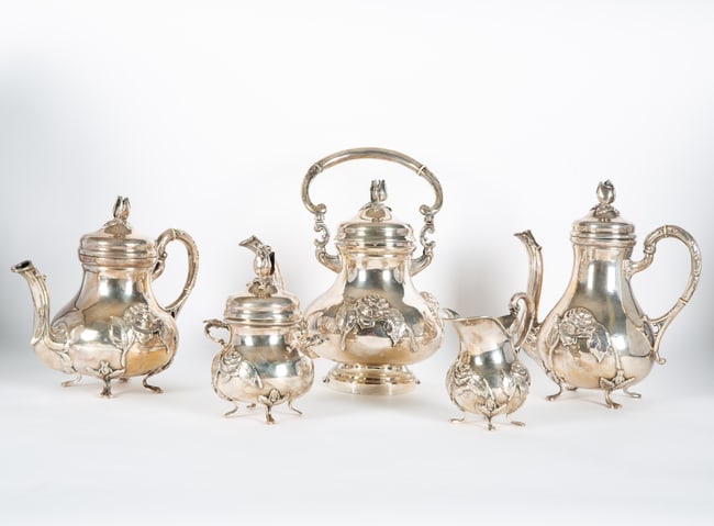 A FIVE-PIECE HANDARBEIT SILVER ROSE SERVICE SET (1 of 2)